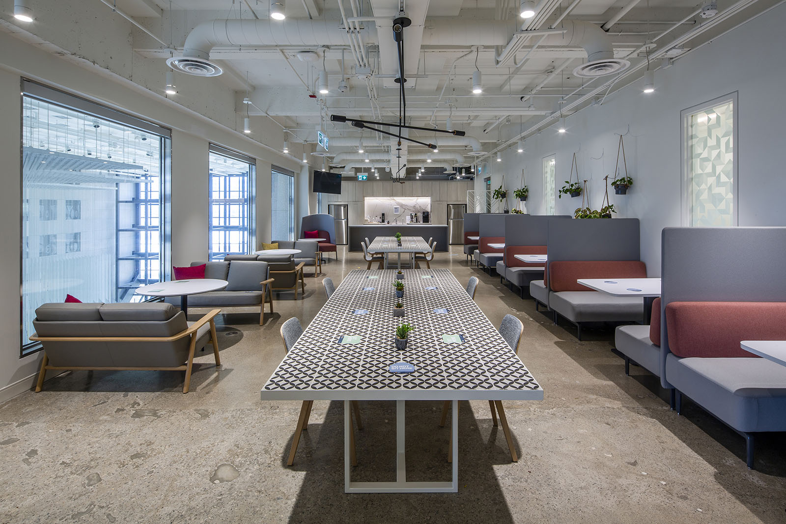 Modern open-plan office space photographed with professional lighting and clean lines