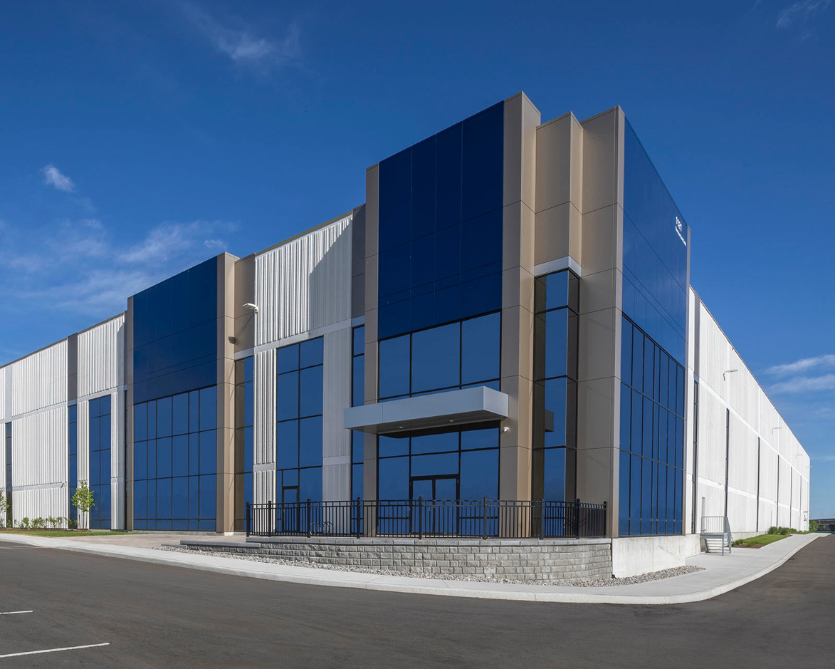 The suburban commercial building exterior was photographed in the early evening