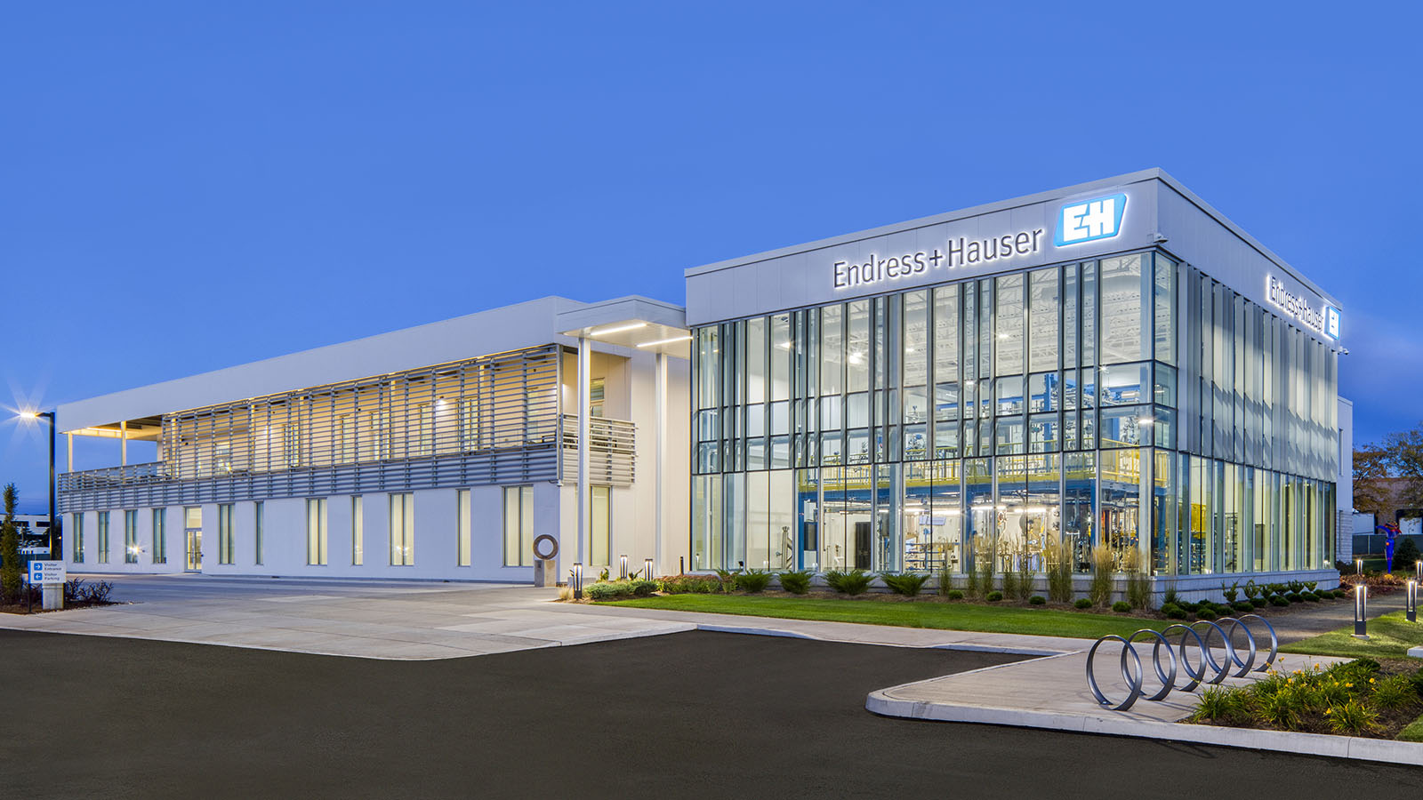 A large commercial building with large windows.