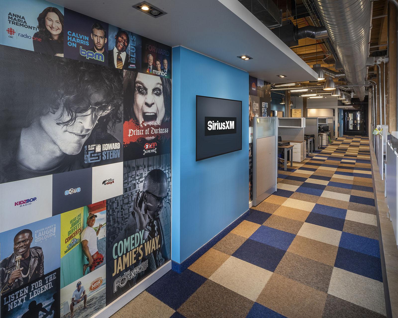 The interior of an office entrance with colorful images on the wall
