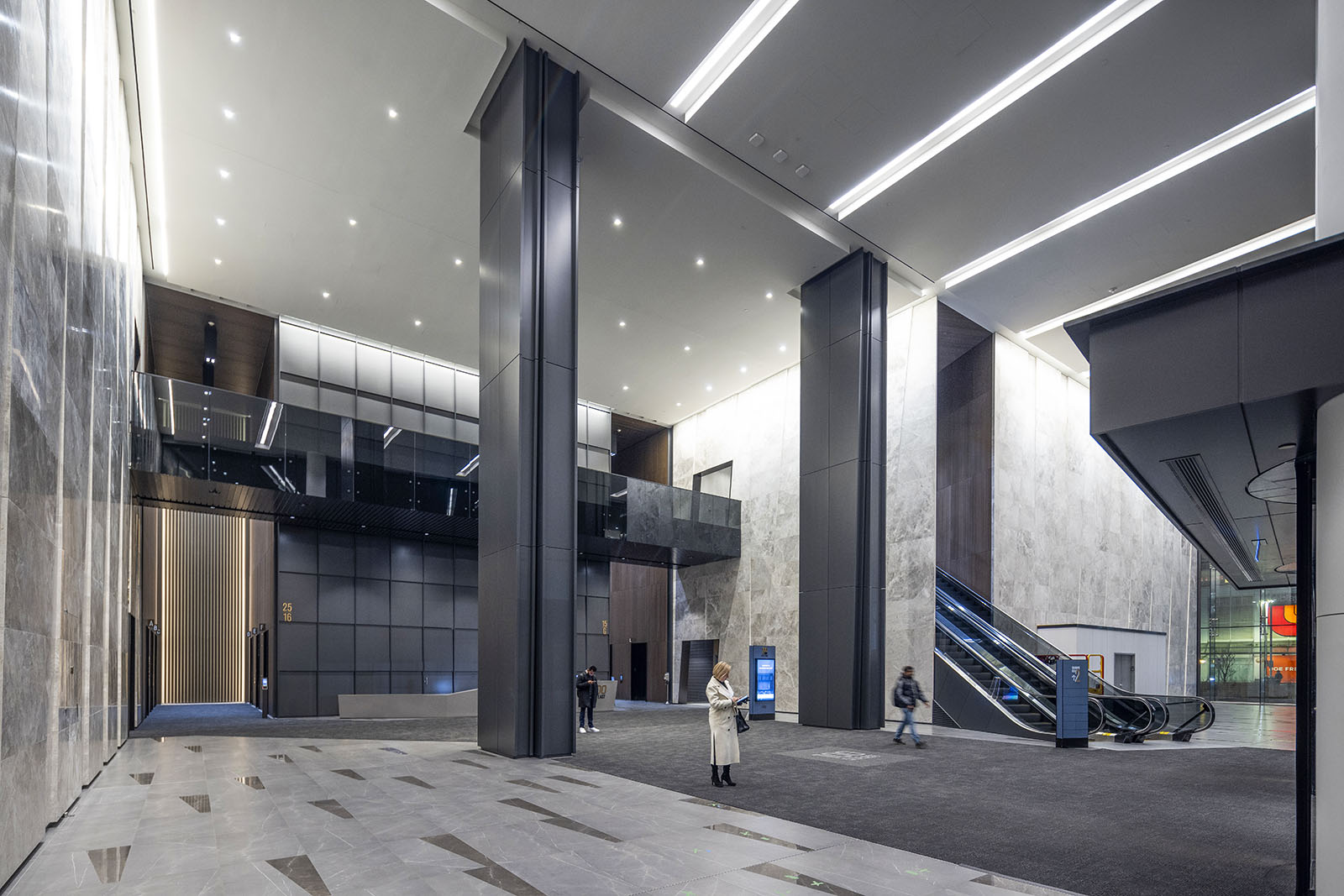 A large commercial building under the escalator.