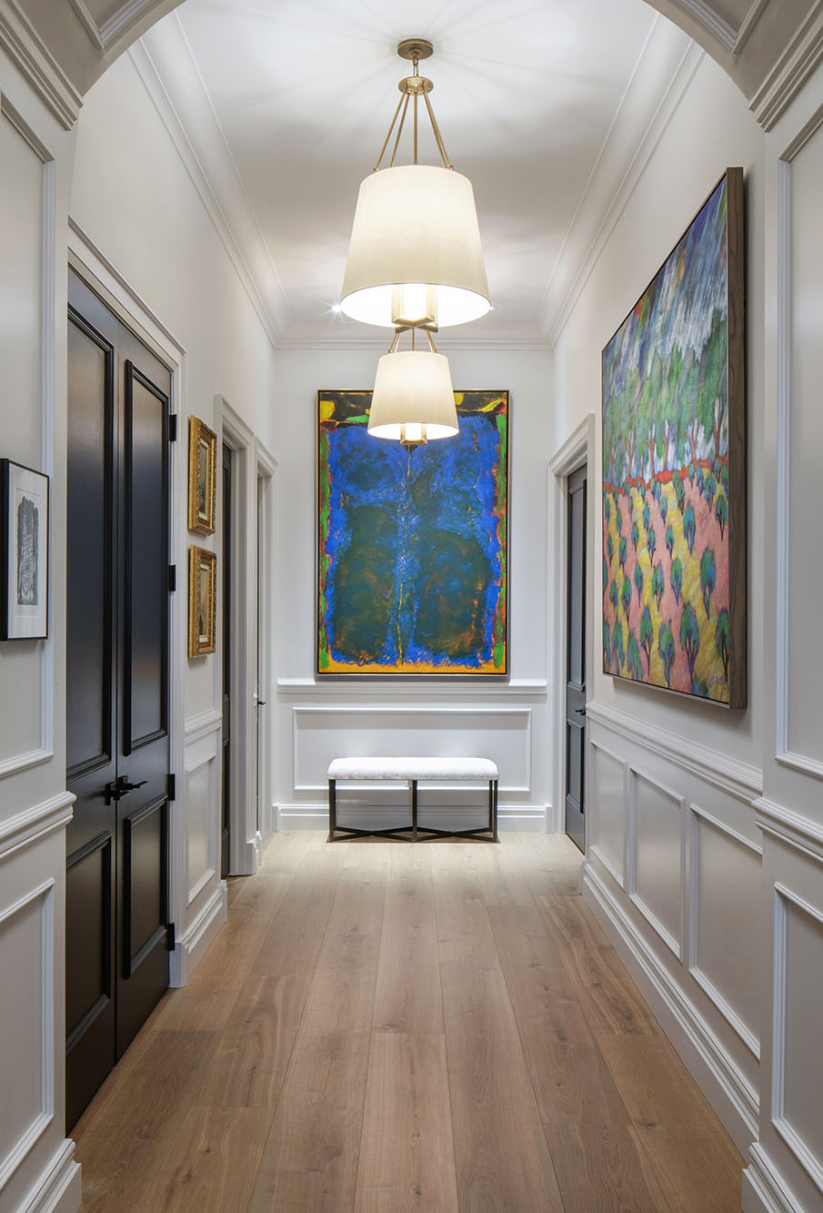 A large corridor with frames, colors, and more.