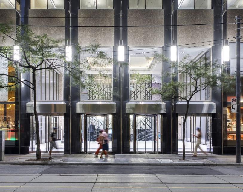 A large glass window building meant for professional photography.
