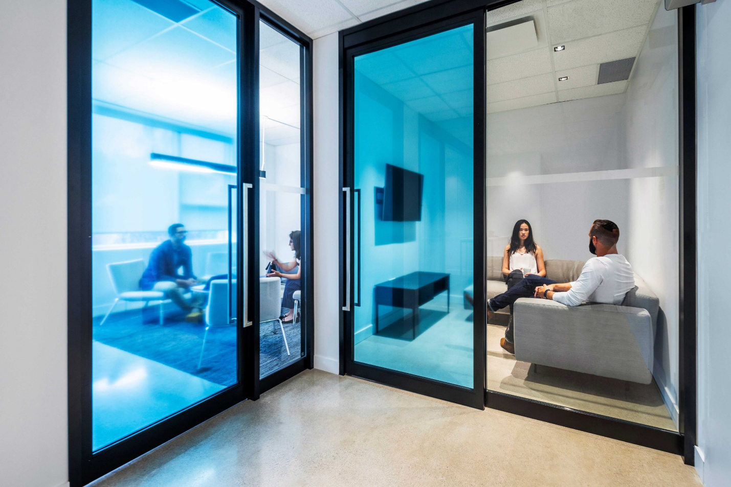 A commercial office with glass doors and more. 