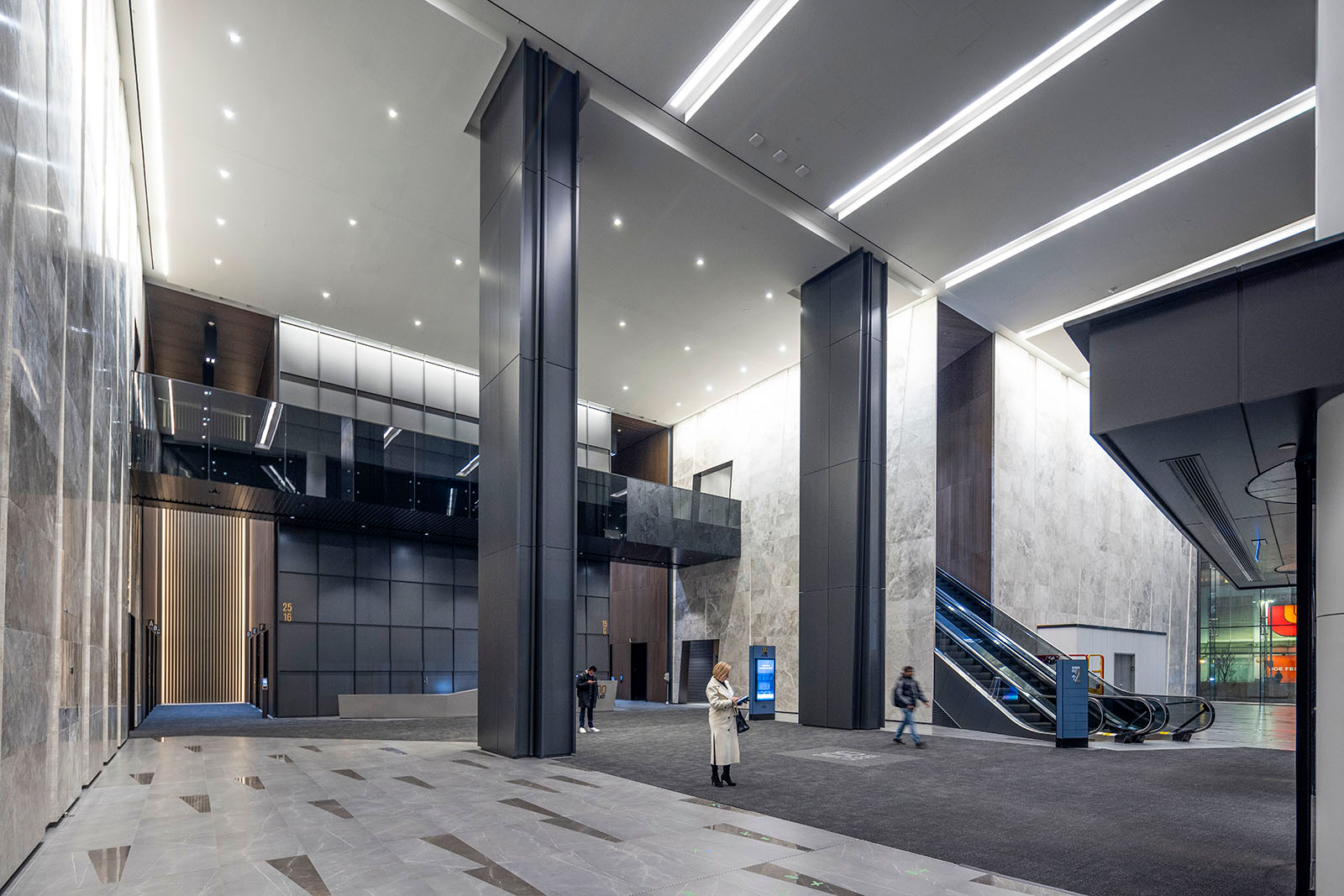 Scale and materials do the talking in this lobby shot, the kind of facility imagery that gives corporate publication photography its sense of place.